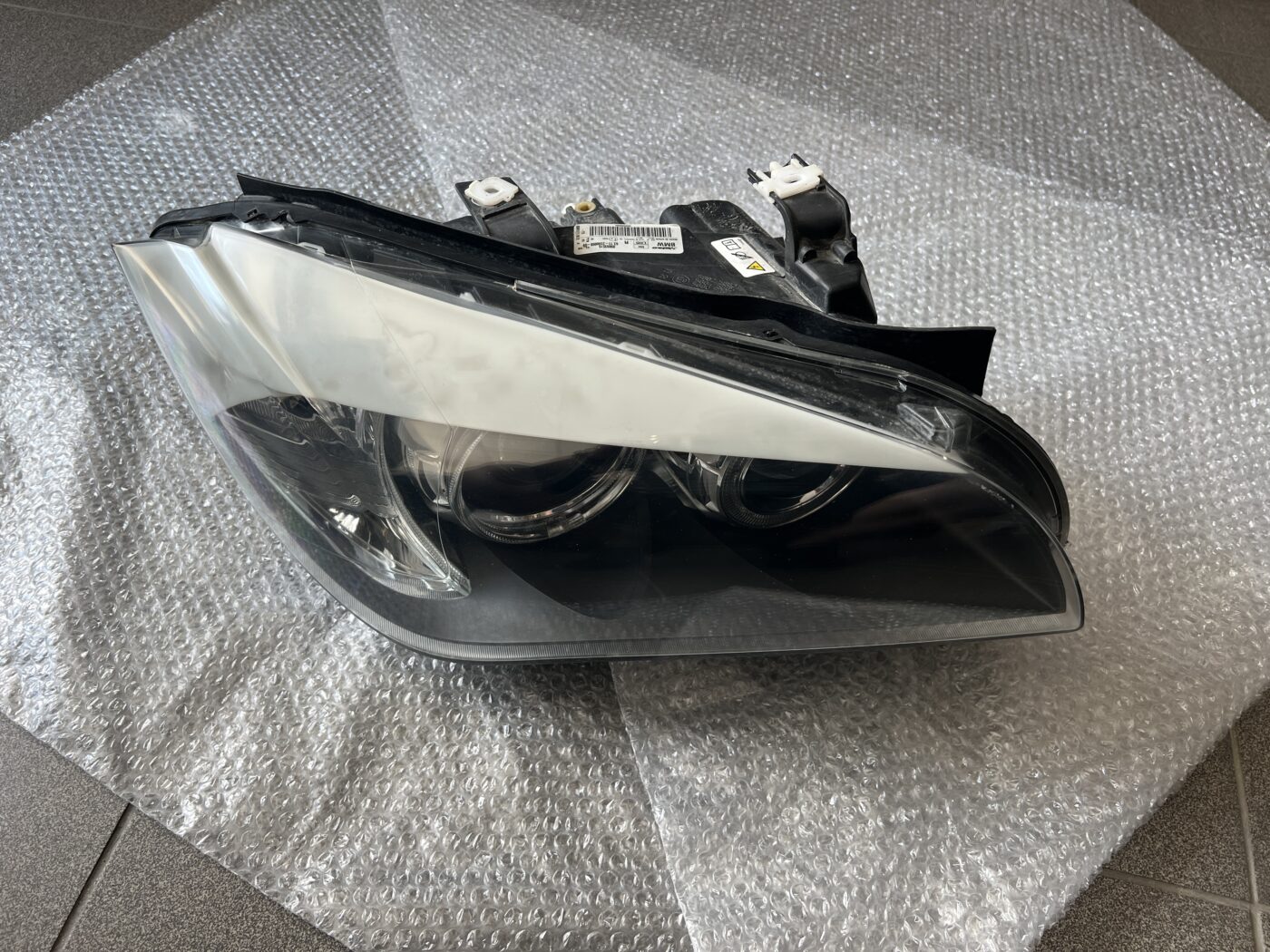 Priekšējais labais lukturis priekš BMW X1 E84 2009-2015 1 Priekšējais labais lukturis priekš BMW X1 E84 2009-2015