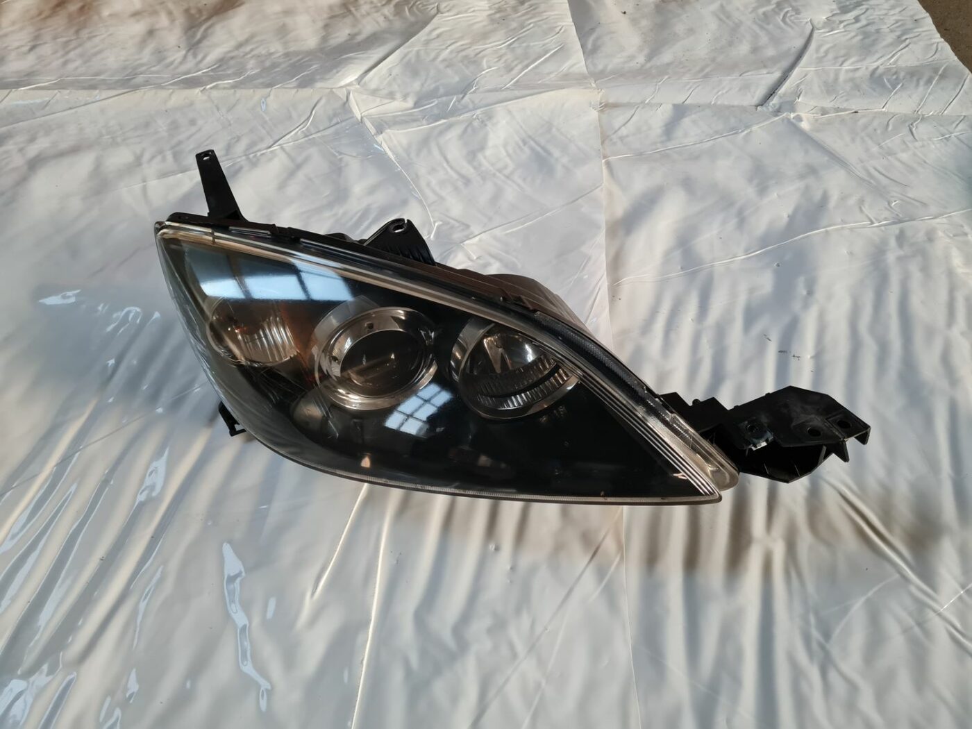 Priekšējais labais lukturis priekš MAZDA 3 2007 1 Priekšējais labais lukturis priekš MAZDA 3 2007