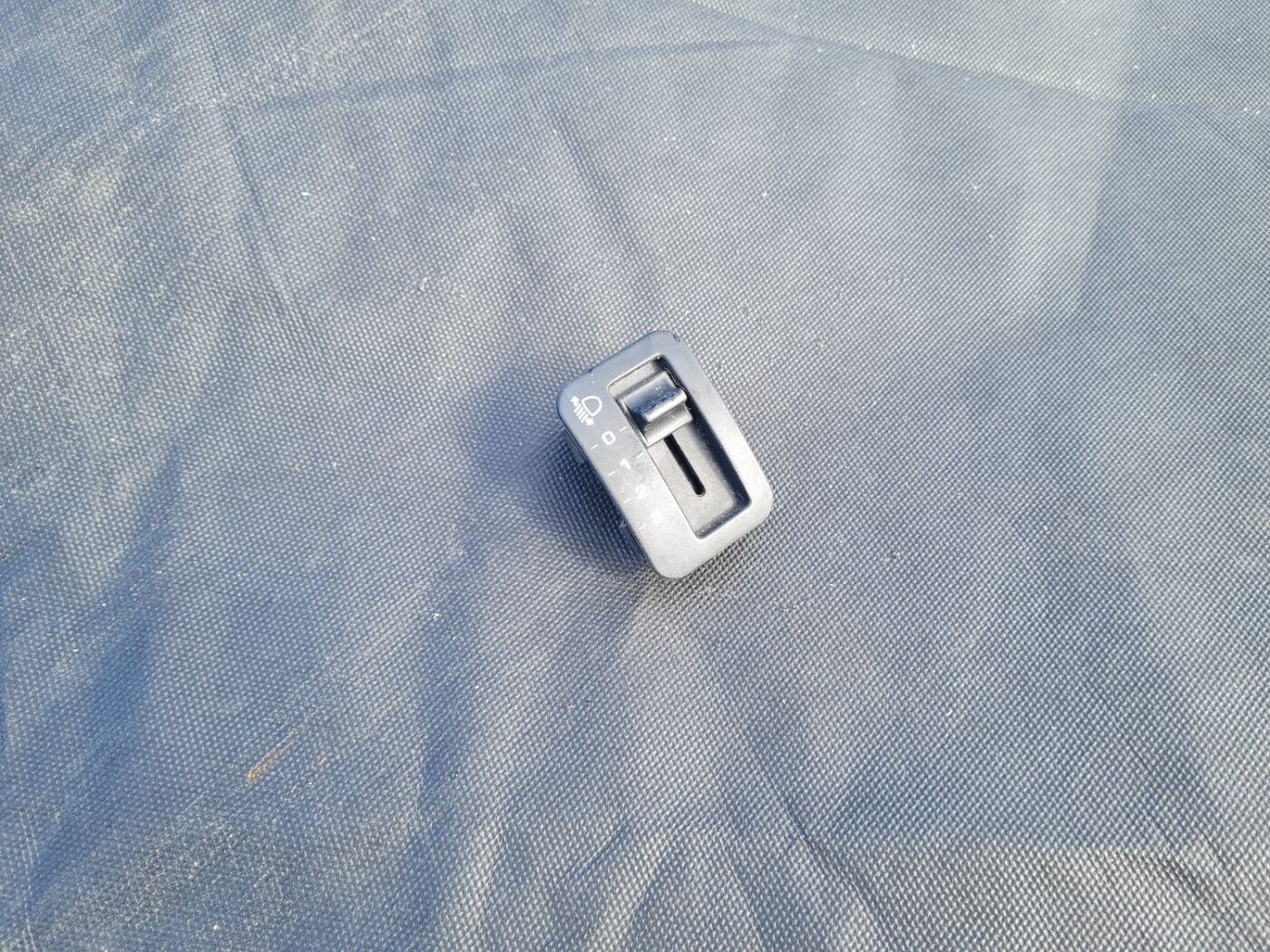 Lukturu augstuma regulēšanas poga priekš JEEP GRAND CHEROKEE 2004 1 Lukturu augstuma regulēšanas poga priekš JEEP GRAND CHEROKEE 2004