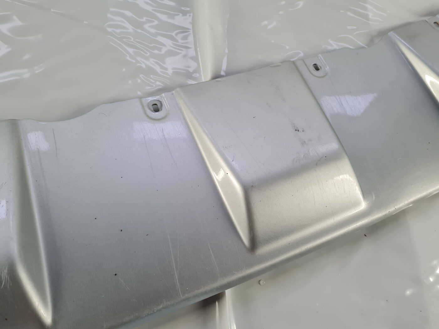 Bufera spoileris priekš VW AMAROK 2010-2020 9 Bufera spoileris priekš VW AMAROK 2010-2020