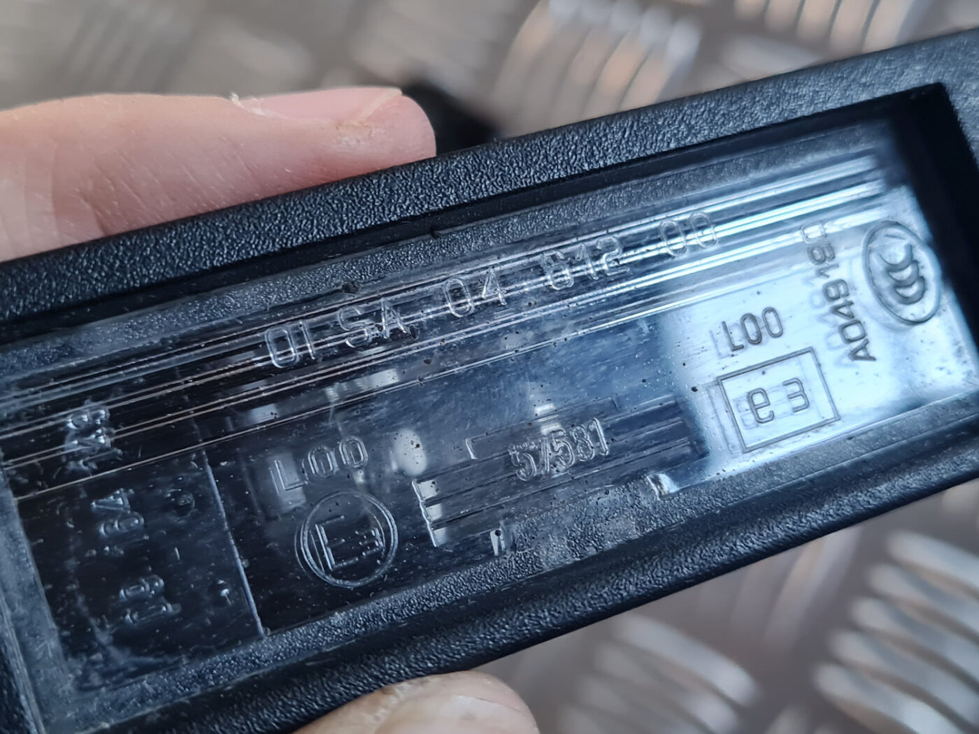 Numura zīmes apgaismojums priekš OPEL INSIGNIA 2010 4 Numura zīmes apgaismojums priekš OPEL INSIGNIA 2010