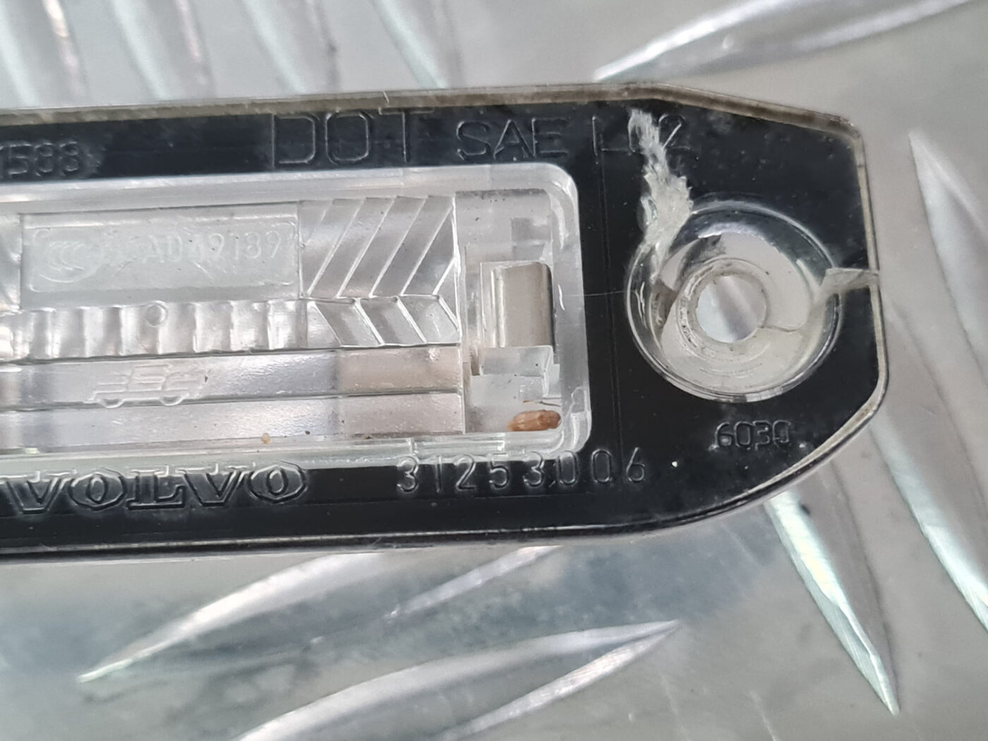 Numura zīmes apgaismojums priekš VOLVO XC 60 2009 4 Numura zīmes apgaismojums priekš VOLVO XC 60 2009